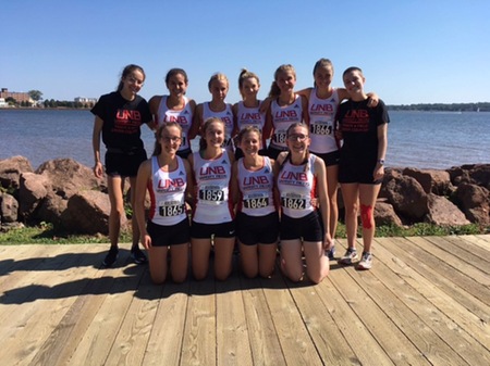 The UNB Reds women's cross country team pose in advance of the opening race of the 2018 Atlantic University Sport season, Saturday, in Charlottetown. (Photo: Submitted)