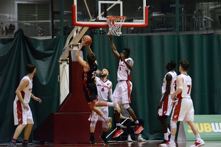 UNB's Will Legere goes to the basket during Saturday's 91-84 win at Memorial. (Photo: Memorial Athletics)