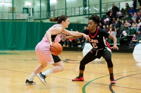 UNB's Ja'Yon Leak defends against a UPEI push during Saturday's 77-59 loss. (Photo: Thomas Becker/for UPEI Athletics)
